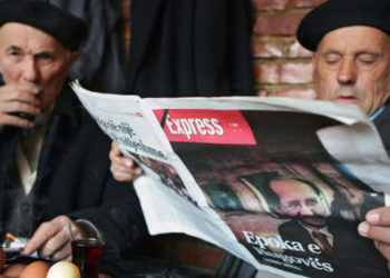 Old Men Read Newspapers in Kosovo